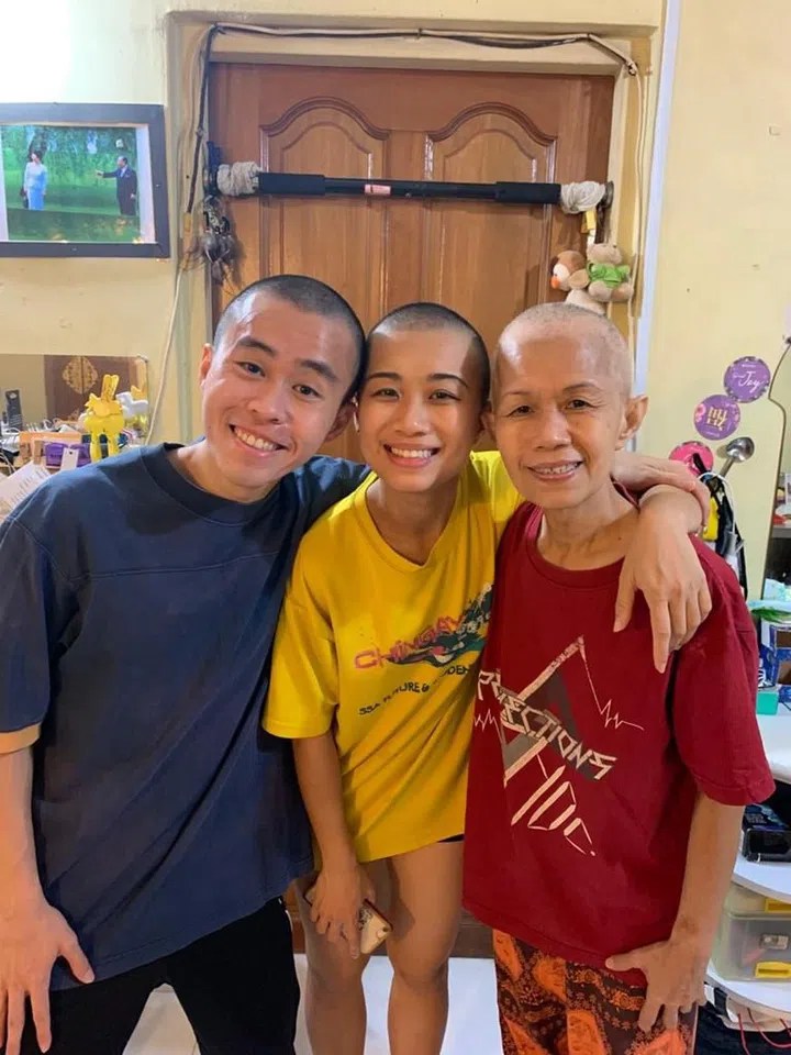 Marcus and May shaved their heads in solidarity with their mother during her active treatment. Photo credit: Toh Hui Lin