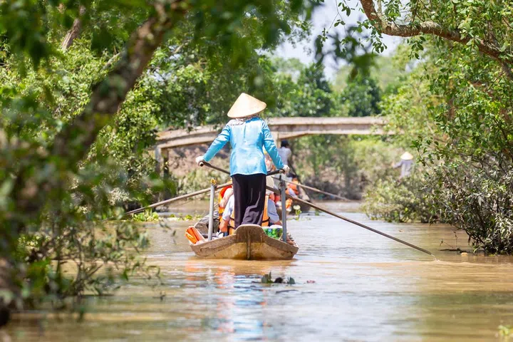 Mekong River Delta river cruise on row boats on a hot summer's day