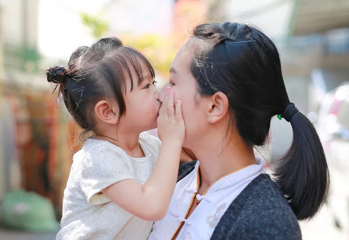 Instead of assuming it’s okay, ask for your baby’s permission before dressing or touching them 