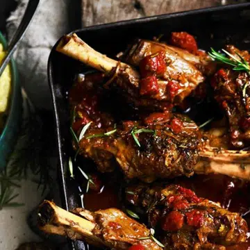 Tomato-Braised Lamb Shanks With Creamy Polenta