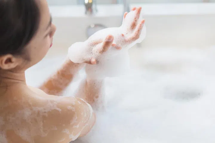 Woman  bathing in a   bathtub