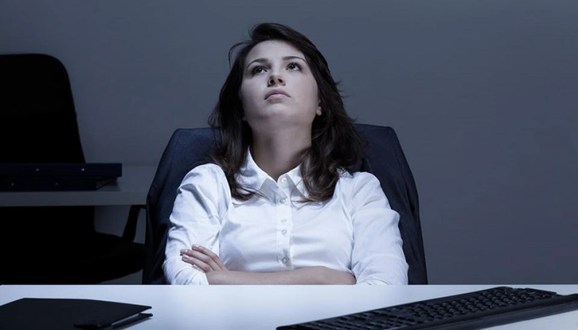 View of thoughtful businesswoman in the office