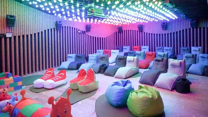 The colourful venue will be Singapore’s first free-seating cinema hall with beanbag loungers instead of theatre seats. Photo: Shaw Theatres