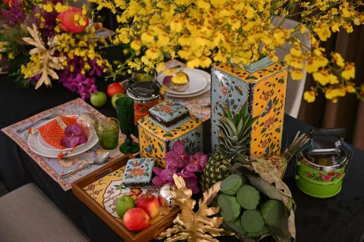 To blend Asian elements with a Christmassy tablescape, he suggests weaving Peranakan motifs, patterns and accents around Yuletide staples. ST PHOTO: SHINTARO TAY