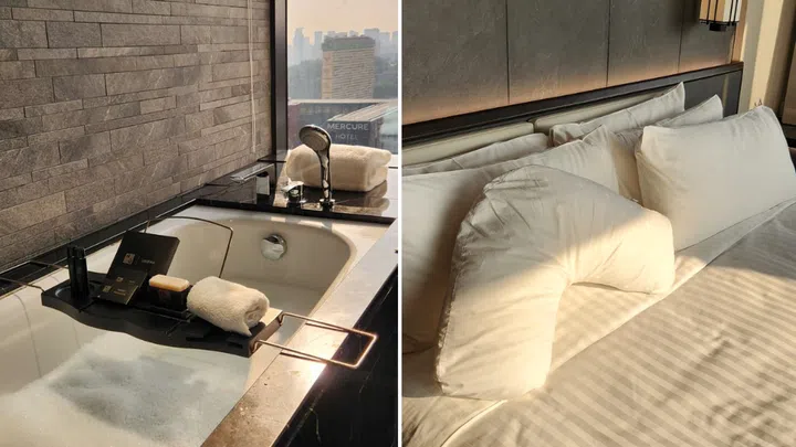 You'll appreciate thoughtful details like a bath tray and a pillow menu. Credit: Michelle Lee/The Singapore Women's Weekly