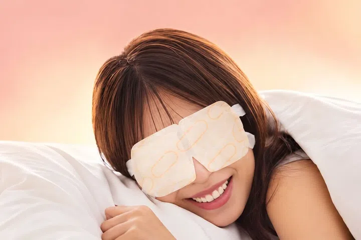 A warm eye mask like MegRhythm can help you fall asleep and improve sleep quality