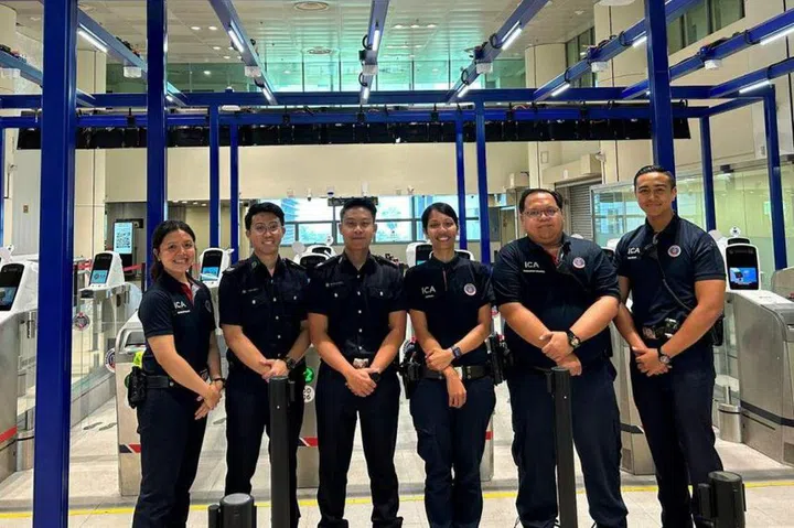 ICA officers (from left) Qaisarah Hata, Adam Mudrik Ng Christopher, Muhammad Haziq Hazli, Nurhuda Afendi, Muhammad Shamsul Said and Muhammad Dzulhilmie Samat. PHOTO: ICA