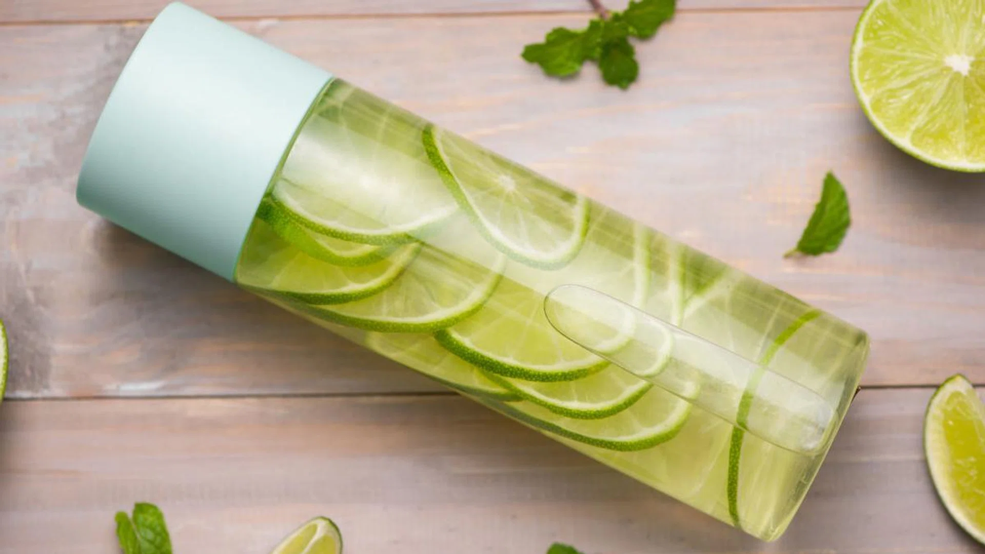 Detox Infused Water with Lime and Mint in Sports Bottle, with sl