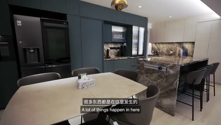 The spacious area around the island is where the family loves hanging out. It also houses the couple's alcohol collection. Photo: Youtube screengrab/Just Swipe Lah