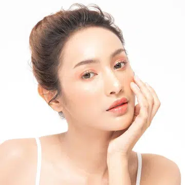 Asian women touching her face
