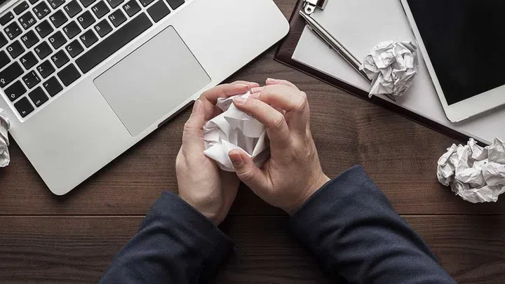 Workaholism — an expression of perfectionism —is an addiction that too often is rewarded by society. (Photo by Envato)