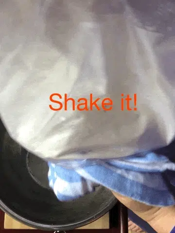 06. Shake both bags for 7 to 10 minutes. The ice will turn to water and the cream mix will harden into a soft ice-cream.