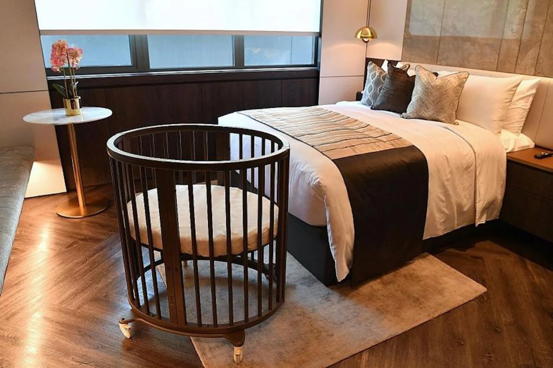 Kai Suites' rooms (above) are fitted out with queen-and king-size beds as fathers are encouraged to stay over while bassinets are provided for the babies. Confinement meals are planned in consultation with nutritionists and TCM practitioners. Photo: Chong Jun Liang 