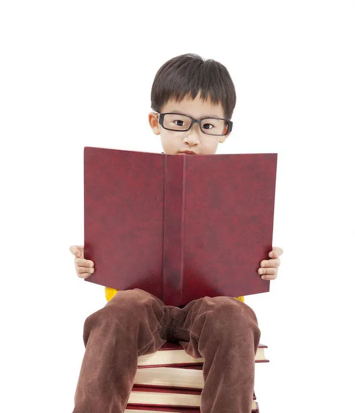 16934306 - little boy studying on the books