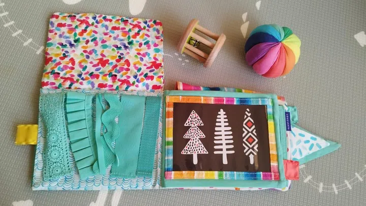 The Charmer Play Kit includes a book with different sensory textures to keep my baby occupied. Photo: Melody Bay