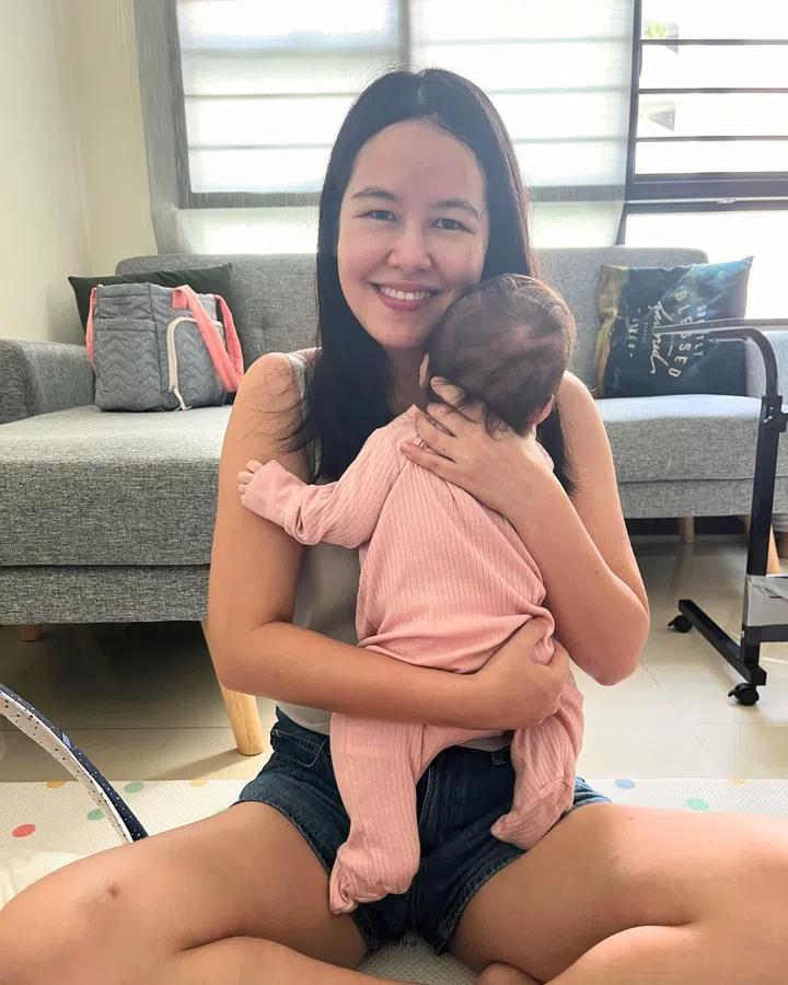 Reuniting with my baby after returning from my trip.