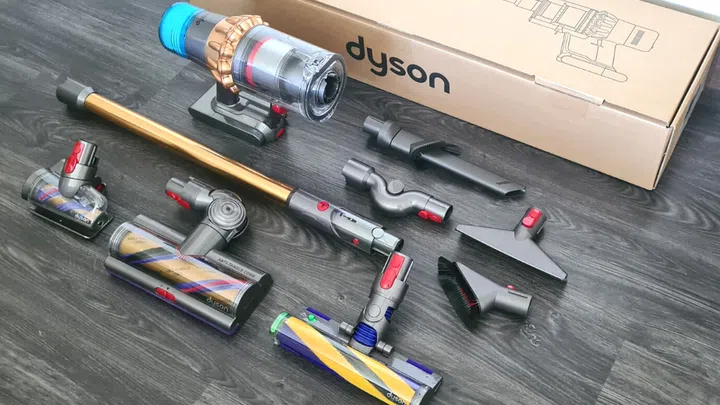 What you get in the box (Dyson V15 Detect Absolute (HEPA)): The vacuum, along with two cleaning heads and eight tools, including an in-built one. There's also a free-standing grab-and-go Dok, a docking station, and a charger. Photo: The Singapore Women's Weekly