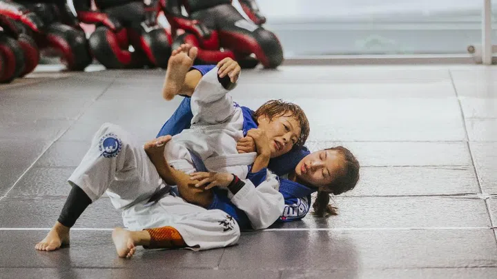 Advanced BJJ female students in a workshop with Marcus Buchecha at Evolve MMA, Singapore
