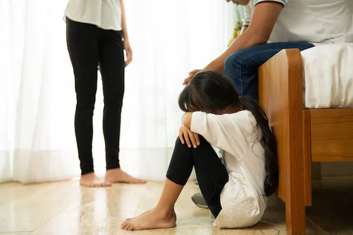 Asian family having relationship problems and feeling unhappy