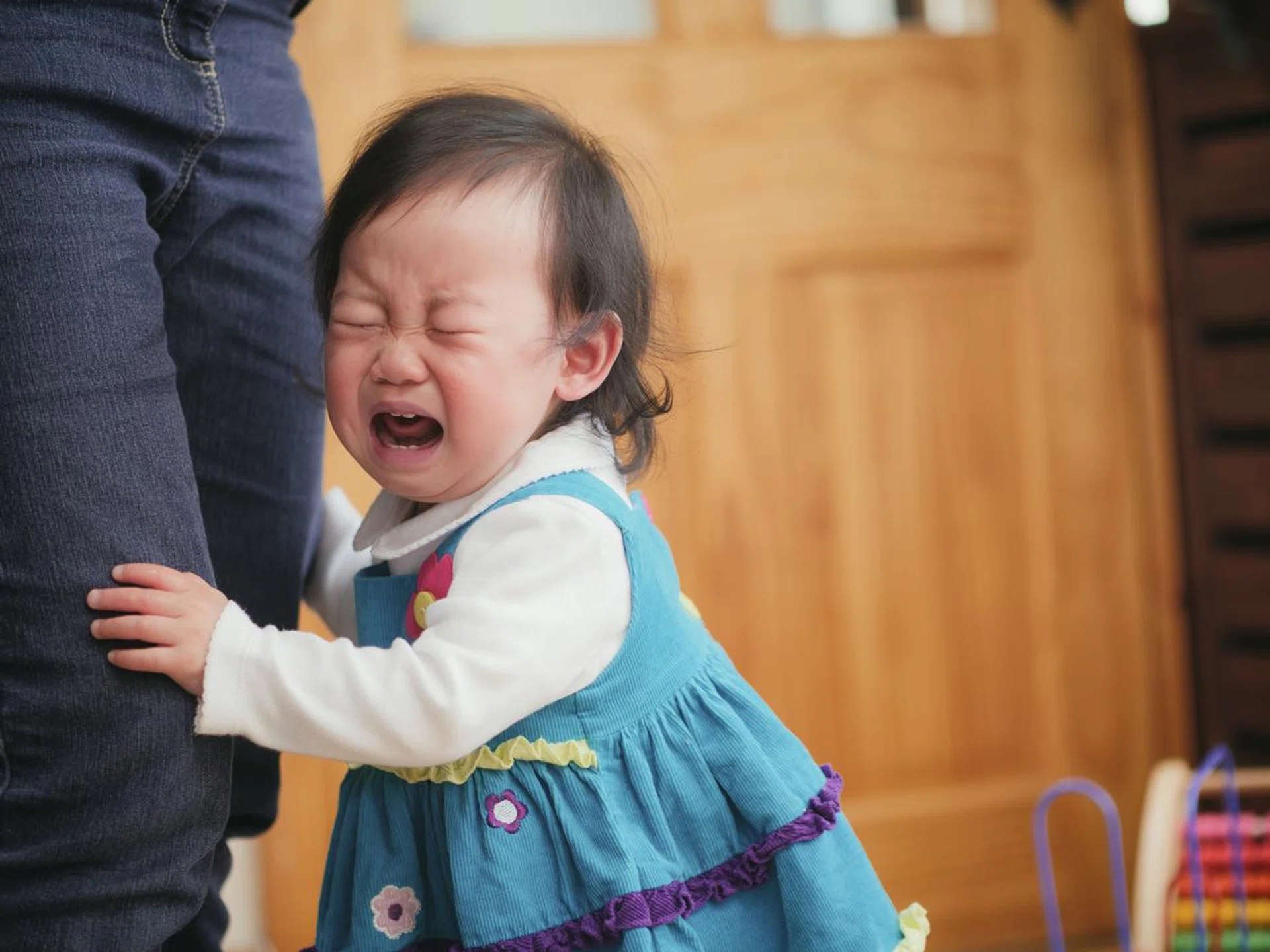 crying baby girl at home