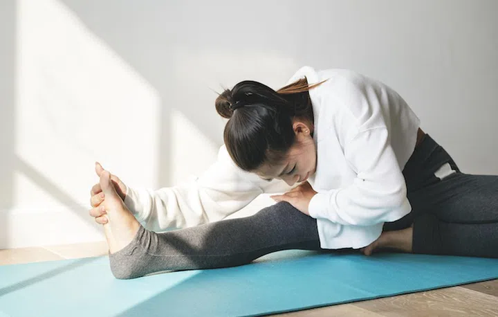 Asian woman stretching