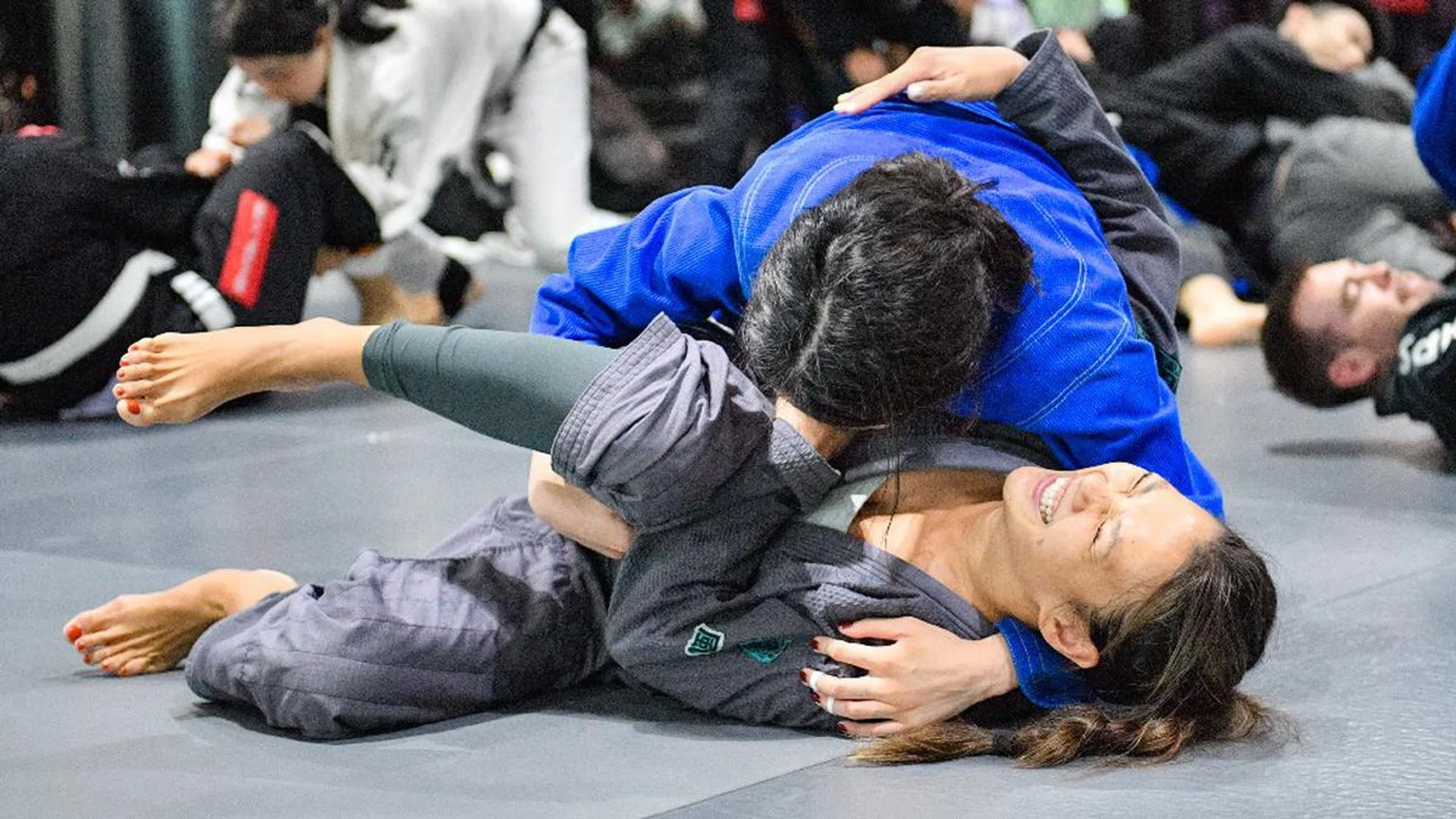Advanced BJJ female students in a workshop with Marcus Buchecha at Evolve MMA, Singapore
