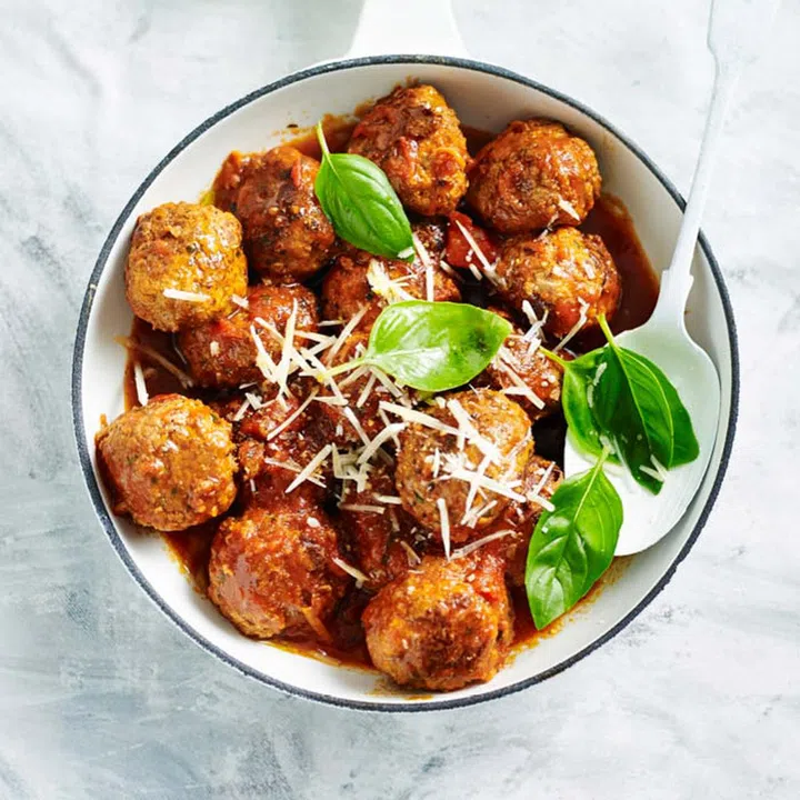 01. To make meatballs:





Shape 1 1⁄2 tbsps of Basic Mince into balls. Heat 1 tbsp olive oil in a large frying pan; cook balls, in batches, until browned.
Remove from pan. Add 700 g tomato passata and 1 cup chicken stock to pan; bring to the boil.
Return meatballs to the pan. Reduce heat, simmer for 5 mins or until cooked. Serve with parmesan and basil leaves.