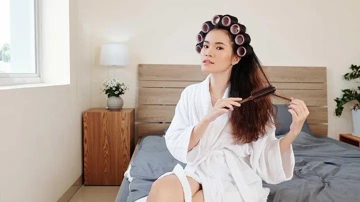 Aggressively brushing wet or dry hair, and pulling hair back too tightly can cause snapped strands to stand on end. 