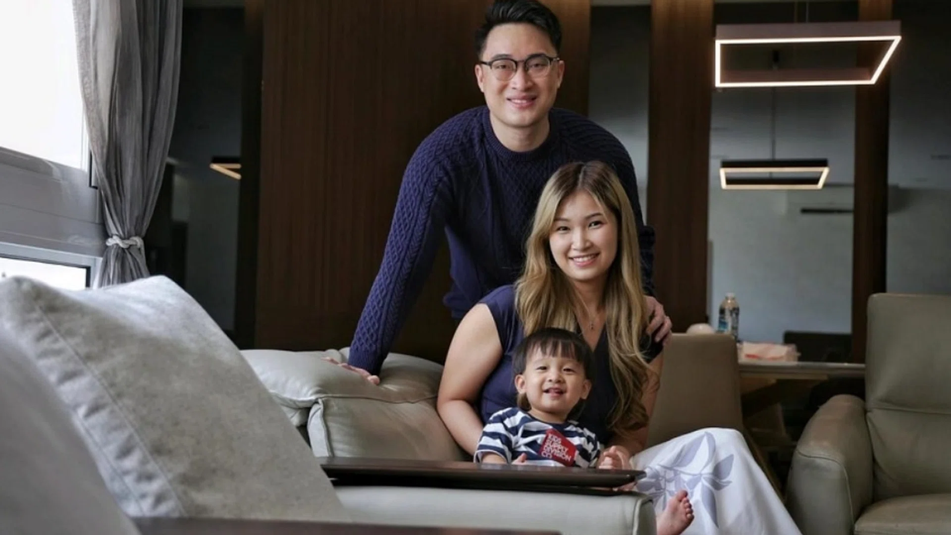 Mrs Louisa Yeo with her husband Justin and their 17-month-old son Hans. ST PHOTO: KEVIN LIM