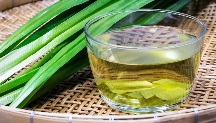 Pandan Juice In Glass  And Pandan Leaves , Pandan healthy drink water on basket