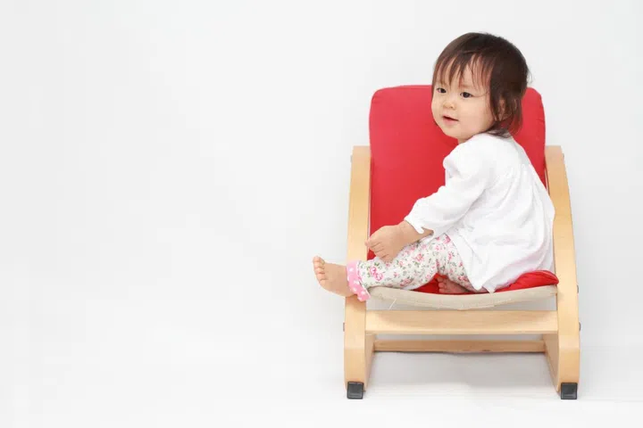 Instead of high chairs and tall shelves, use baby-sized furniture 