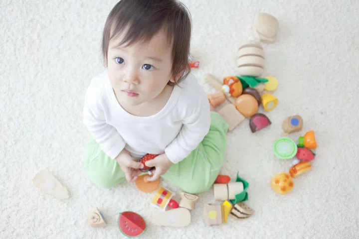 42370437 - boy playing with toys