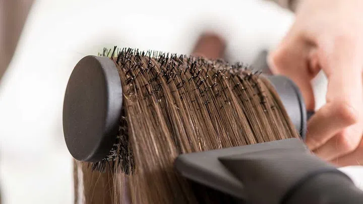 I want a blow dry that's voluminous at the roots.  (Photo by Envato)