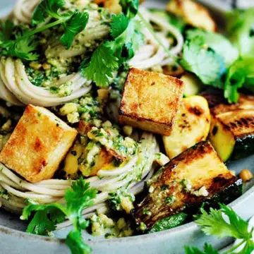 recipe for Zucchini and tofu noodles with coriander pesto dressing