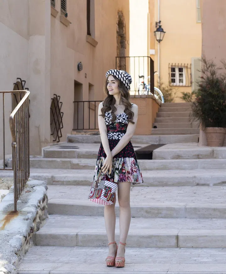 Lily Collins as Emily in episode 202 of Emily in Paris. Image credit: Carole Bethuel/Netflix © 2021
