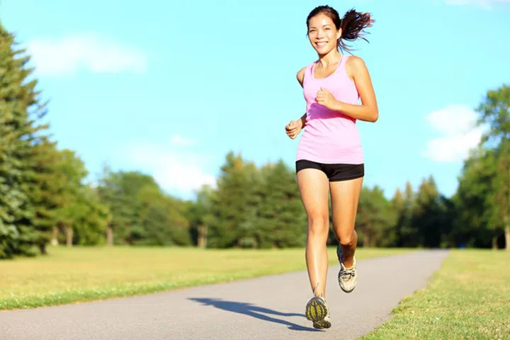 13319075 - sport fitness woman running in park on summer day. asian female runner during outdoor workout. fit sport fitness model of mixed asian / caucasian ethnicity.
