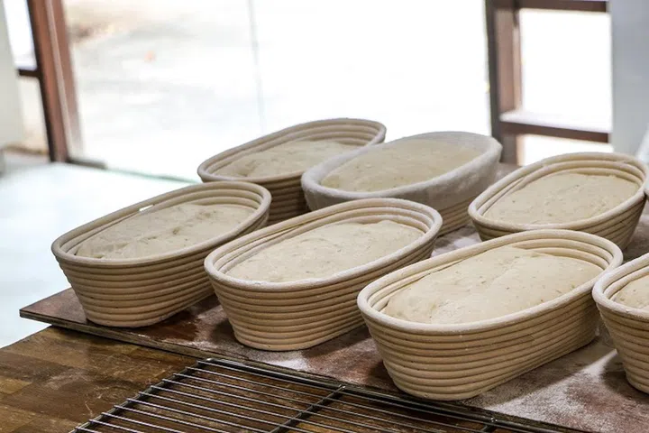 01. Items needed: Water and some flour
01. Prepare your breadbasket by sifting a bit of rice flour on it. Remove the dough and place it on a lightly floured surface. Don’t overpress it while doing the final shape of the sourdough.