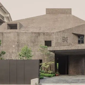 grey brick bungalow orchard