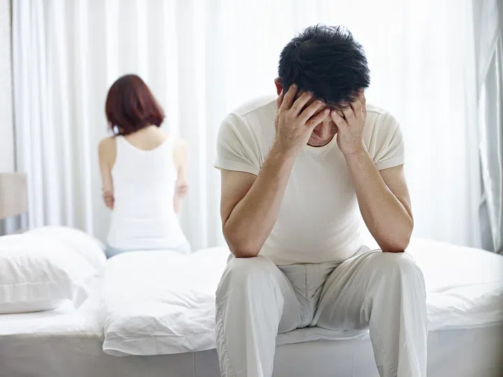 young asian couple with relationship problem appear depressed and frustrated.