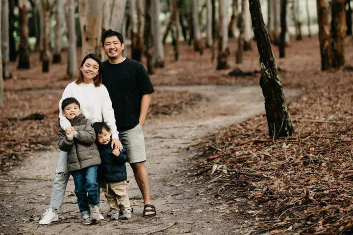 Mr Ian Tan with his wife Jasmine Tan and sons Josiah (left) and Isaiah in Perth. Photo: Ian Tan