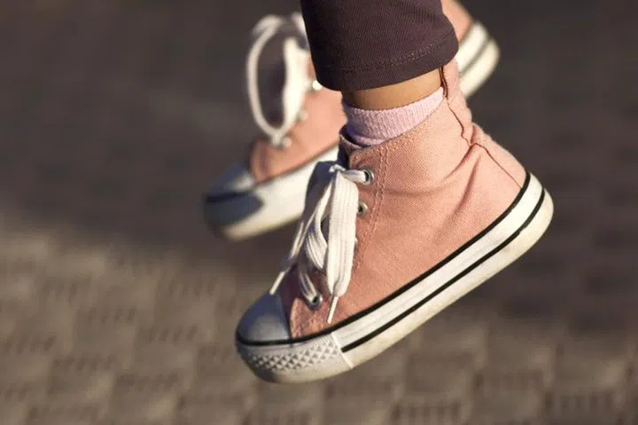 Macro close up of shoes of a young girl
