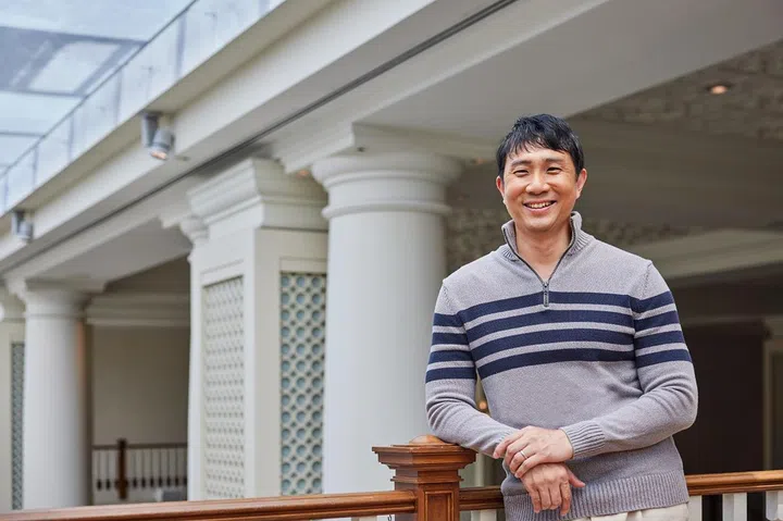 On Jamus Lim: Pullover, Jamus’ own. Cotton pants, Brunello Cucinelli.