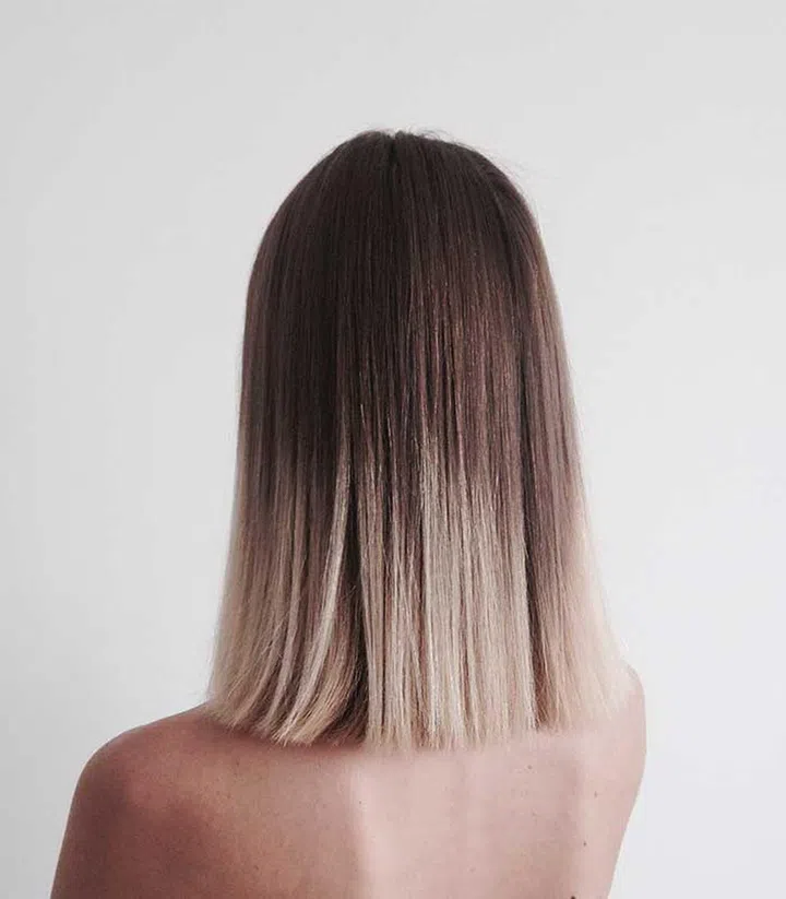 If you're looking for a balayage blonde hair colour, say "My hair is a little too blonde and I need to show dimension in it again." (Photo by Envato)