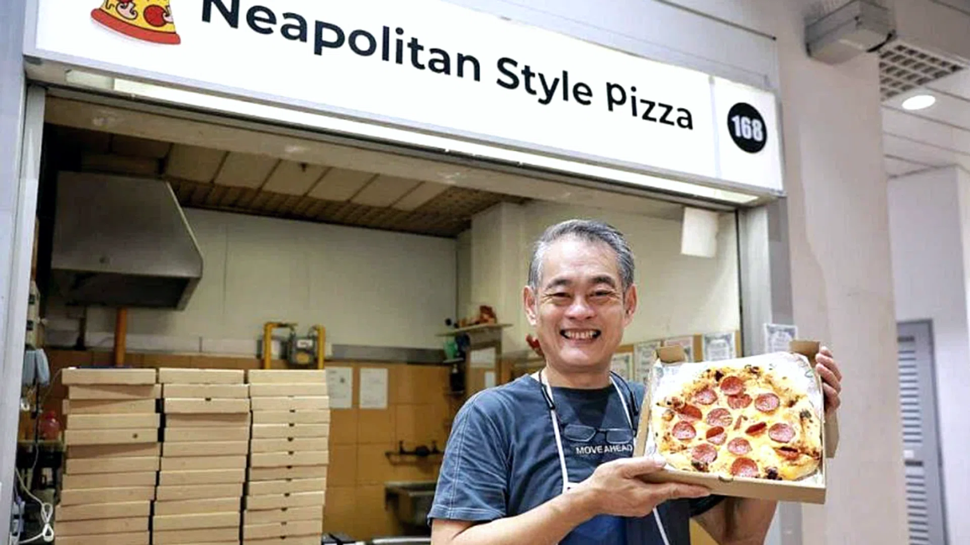 Mr Henry Teong set up 168 Neapolitan Style Pizza at Taman Jurong Food Centre to create a future job for his 16-year-old son Jonas, who has autism. ST photo: Kevin Lim