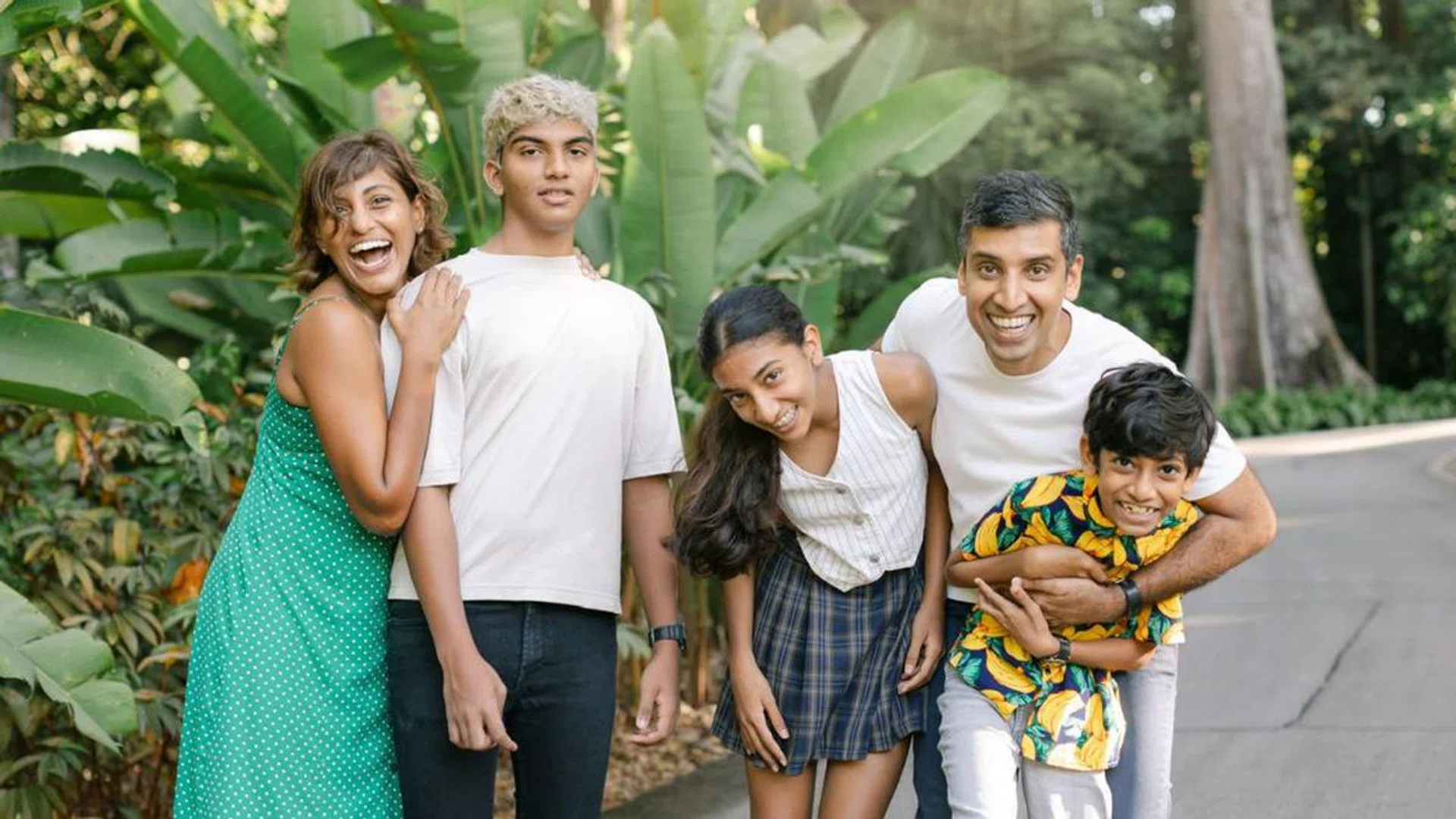 Dr Mythili Pandi, her husband and their three children. Photo: Gunila/Sugarlight Photography