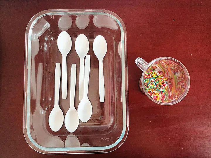Place your spoons in a container, just to catch any chocolate drops.