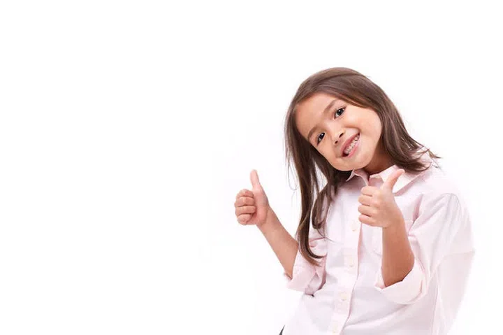 41432381 - kid giving two thumbs up