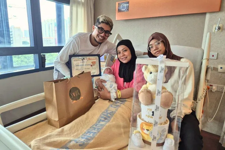 Baby Muhammad Noah Rizq, Nur Faizah Binte Hamid, 36, Muhammad Hadi Bin Harris, 39 and their first child, 16-year-old Riquesya Nur Qistina Binte Muhammad Hadi at KKH