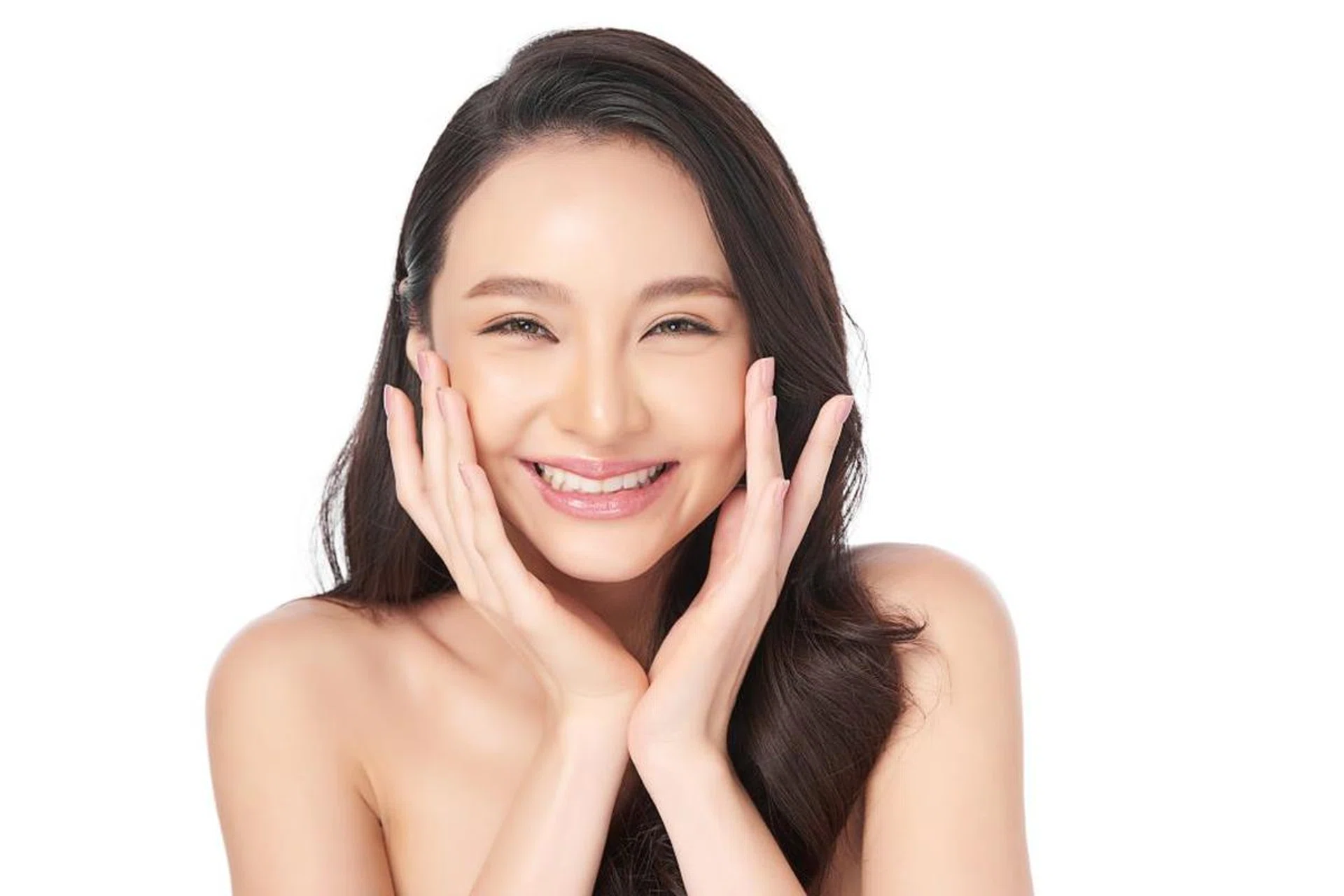 asian woman with hands on her face