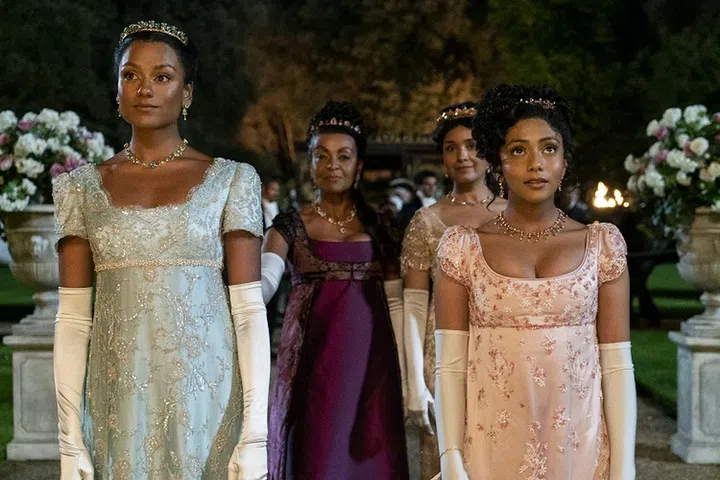 Bridgerton. (L to R) Simone Ashley as Kate Sharma, Adjoa Andoh as Lady Danbury, Shelley Conn as Mary Sharma, Charithra Chandran as Edwina Sharma in episode 201 of Bridgerton. Cr. Liam Daniel/Netflix © 2021